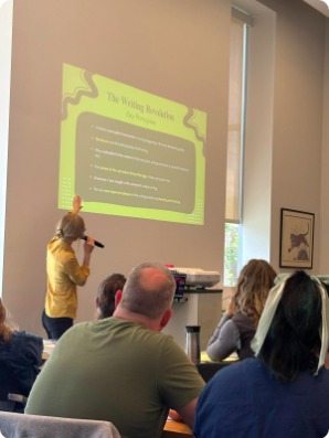 Kara presenting to a whole staff