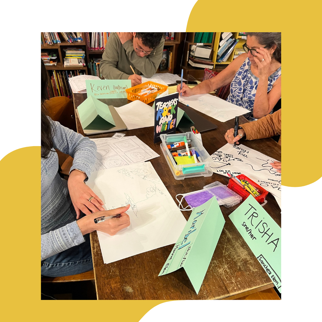 Teachers drawing and writing together