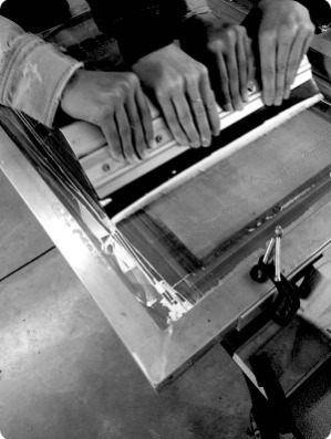 Hands at a loom